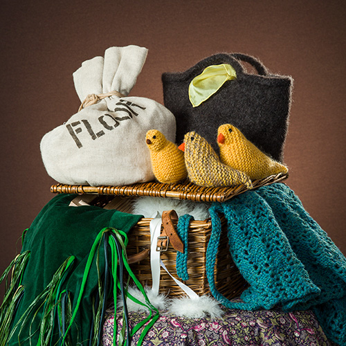 Basket with puppets and props